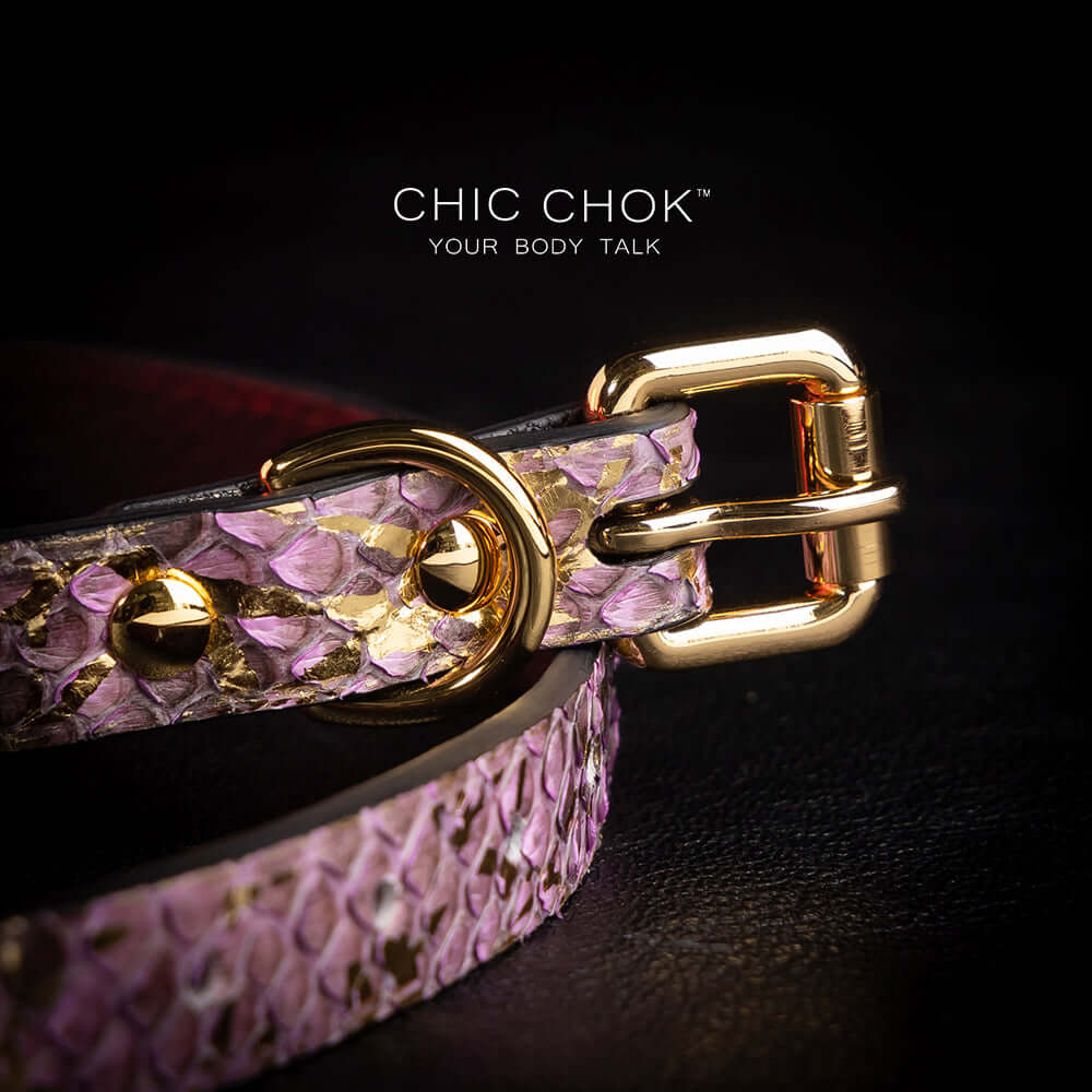 chicchok butterfly choker featuring a textured, intricate butterfly pendant adorned with gold accents and shimmering gemstones for an elegant and luxurious look.