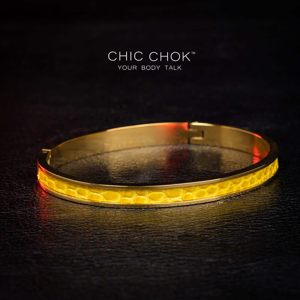 Primitive Mania - Metallic Bracelet A chicchok metal bracelet with yellow lizard skin dances like a nighttime bonfire.