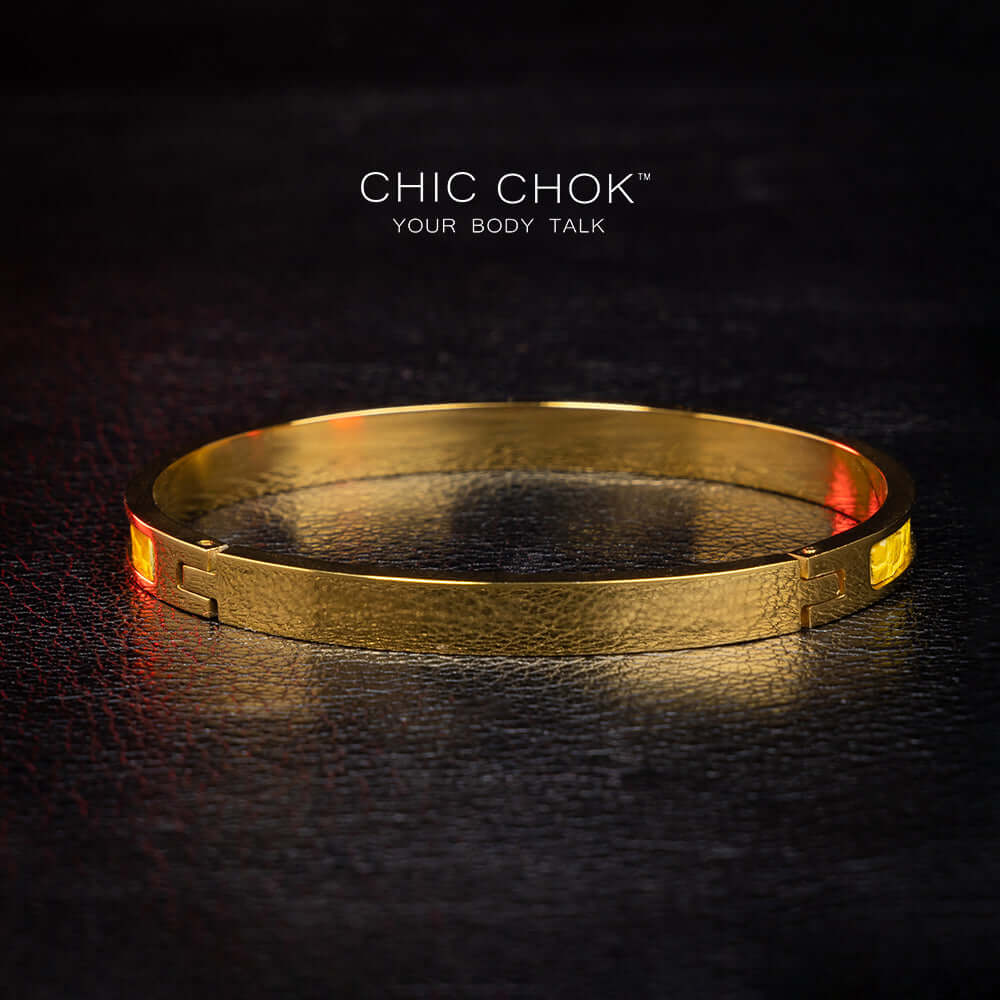 Primitive Mania - Metallic Bracelet A chicchok metal bracelet with yellow lizard skin dances like a nighttime bonfire.