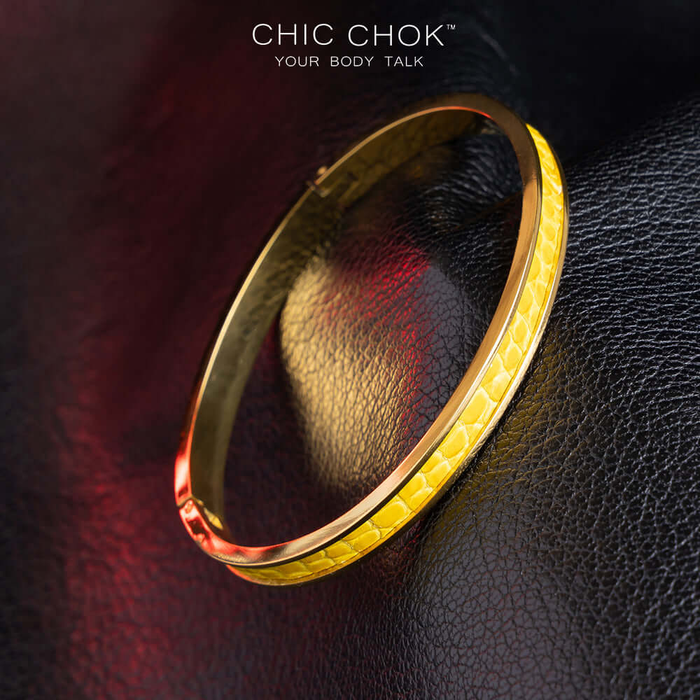 Primitive Mania - Metallic Bracelet A chicchok metal bracelet with yellow lizard skin dances like a nighttime bonfire.